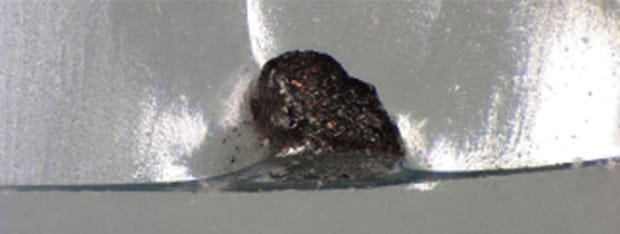 Observation of foreign particles from the surface view (left) and from an angle